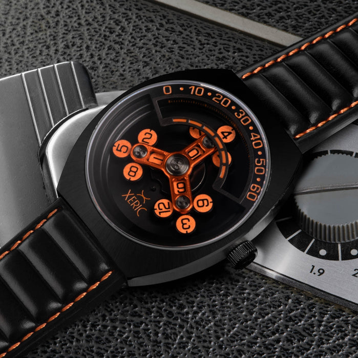 Xeric Scrambler Automatic Wandering Hour Black Orange angled shot picture